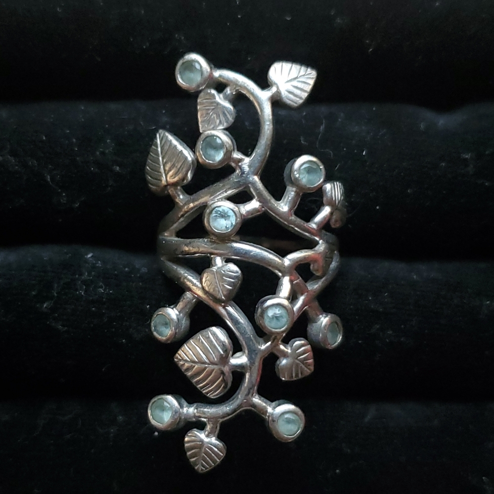 925 sterling silver ring with light blue stones